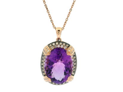 14k Rose Gold Amethyst Pendant with 0.50ct Diamond Accents Necklace: 14k Rose Gold Amethyst Pendant with 0.50ct Diamond Accents Necklace This stunning pendant necklace features a beautiful oval amethyst, measuring approximately 16x12mm, set in solid 14k rose gold. The