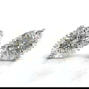 14K White Gold 6.12 Ct. Diamond Stud Earrings I Color SI2 I1: 14K White Gold 6.12 Ct. Diamond Stud Earrings I Color SI2 I1 These stunning 14K White Gold Diamond Stud Earrings feature a total diamond weight of 6.12 carats, showcasing exceptional quality. The earr
