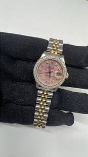 Rolex Datejust Ladies Watch 69173 AM Pink MOP Jubilee Diamond Bezel: Rolex Datejust Ladies Watch 69173 AM Pink MOP Jubilee Diamond Bezel The Rolex Datejust is a stunning timepiece designed for ladies, featuring a captivating AM Pink Mother of Pearl dial. This elegant w