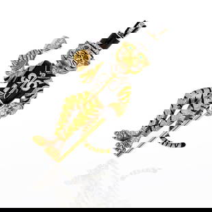 David Webb 18K White Gold Black Enamel Tiger Brooch with Diamonds: David Webb 18K White Gold Black Enamel Tiger Brooch with Diamonds Admire the elegance of this David Webb brooch, expertly crafted from 18K white gold and featuring a striking black enamel finish. This