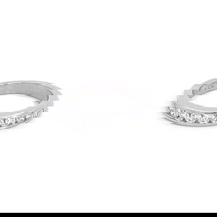 Tiffany & Co. Platinum Diamond Wedding Band Ring with 9 Diamonds: Tiffany & Co. Platinum Diamond Wedding Band Ring with 9 Diamonds This exquisite wedding band from Tiffany & Co. showcases a classic design crafted from platinum with a high polished finish. The band f