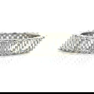 Platinum 3.75 Ct Diamond Eternity Band 36 Baguette Diamonds F-G VS1-SI1: Platinum 3.75 Ct Diamond Eternity Band 36 Baguette Diamonds F-G VS1-SI1 This exquisite Platinum Diamond Eternity Band showcases a stunning array of 36 baguette diamonds, totaling approximately 3.75 ca