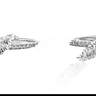 Elegant 1.06 Carat Round Diamond Engagement Ring in 14K White Gold: Elegant 1.06 Carat Round Diamond Engagement Ring in 14K White Gold This stunning engagement ring features a brilliant 1.06 carat round diamond with L/SI1 clarity, elegantly set in 14K white gold. The
