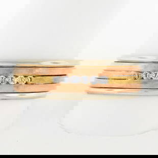 Vintage 14k Multi-Tone Gold 0.10ctw Channel Set Diamond Band Ring: Vintage 14k Multi-Tone Gold 0.10ctw Channel Set Diamond Band Ring This exquisite vintage men's band ring showcases a stunning combination of 14k solid white gold with elegant rose and yellow gold acce