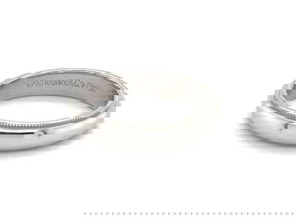 Tiffany & Co. Platinum 4mm Double Milgrain Wedding Band Ring Size 7: Tiffany & Co. Platinum 4mm Double Milgrain Wedding Band Ring Size 7 Discover the exquisite craftsmanship of this Tiffany & Co. Platinum Wedding Band Ring, designed with a 4mm wide double milgrain deta
