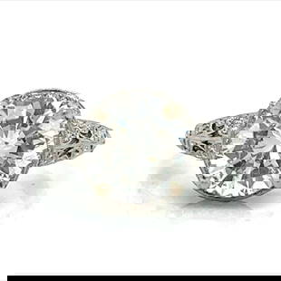 18K White Gold GIA Certified 3.01 Ct Diamond Engagement Ring: 18K White Gold GIA Certified 3.01 Ct Diamond Engagement Ring This stunning 18K White Gold engagement ring features a GIA Certified 3.01 Ct. Round Brilliant Diamond, showcasing a K color and SI1 clarit