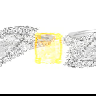 1.38ct Fancy Yellow Cushion Diamond Halo Ring 18k: 1.38ct Fancy Yellow Cushion Diamond Halo Ring 18k This exquisite ring features a stunning 1.38 carat total weight Fancy Yellow Cushion Diamond, graded SI2 clarity, elegantly surrounded by a halo of 36