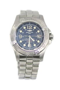 Breitling Superocean A17390 Stainless Steel Watch with Blue Dial and Box: Breitling Superocean A17390 Stainless Steel Watch with Blue Dial and Box This Breitling Superocean wristwatch combines functionality with style. Featuring a striking blue dial and a durable stainless