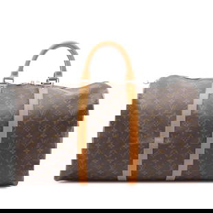 Louis Vuitton Monogram Keepall 50 Travel Bag Canvas Brown: Louis Vuitton Monogram Keepall 50 Travel Bag Canvas Brown The Louis Vuitton Monogram Keepall 50 is a stylish travel bag crafted from durable monogram canvas. It features rolled vachetta leather handle