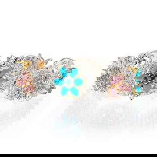 18K Two Tone Flower Bracelet with Turquoise Diamonds 7.5 Inches: 18K Two Tone Flower Bracelet with Turquoise Diamonds 7.5 Inches This exquisite 18K Two Tone Turquoise Diamond Flower Moon Bracelet showcases a stunning design featuring vibrant turquoise diamonds and