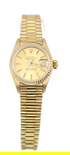 Rolex Datejust 18K Yellow Gold Watch 6917 Champagne Dial Boxed: Rolex Datejust 18K Yellow Gold Watch 6917 Champagne Dial Boxed This exquisite Rolex Datejust wristwatch is crafted from 18K yellow gold, featuring a stunning champagne dial. The watch is powered by a