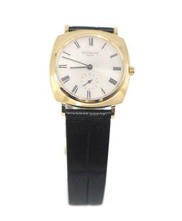 Patek Philippe Calatrava 18K Yellow Gold Watch Ref 3525: Patek Philippe Calatrava 18K Yellow Gold Watch Ref 3525 This exquisite Patek Philippe Calatrava wristwatch features a stunning 18K yellow gold case with a diameter of 32mm, offering a timeless eleganc