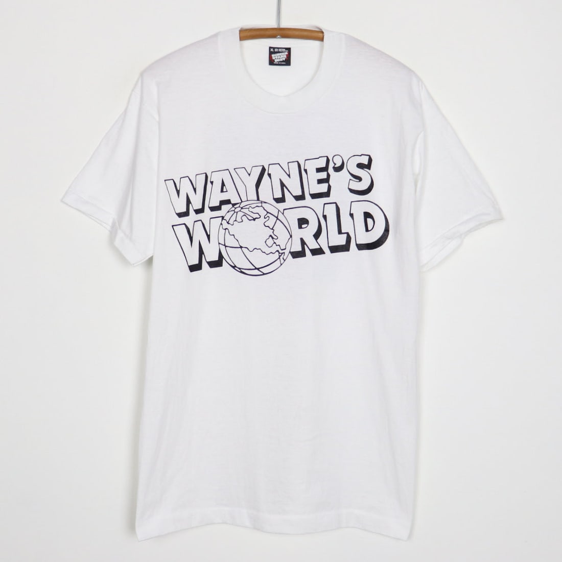 Vintage 1990s Wayne's World Shirt with Graphics: Vintage 1990s Wayne's World Shirt with Graphics Discover this original vintage 1990s Wayne's World shirt, a true collectible piece from the iconic era, featuring striking front and back graphics. The 