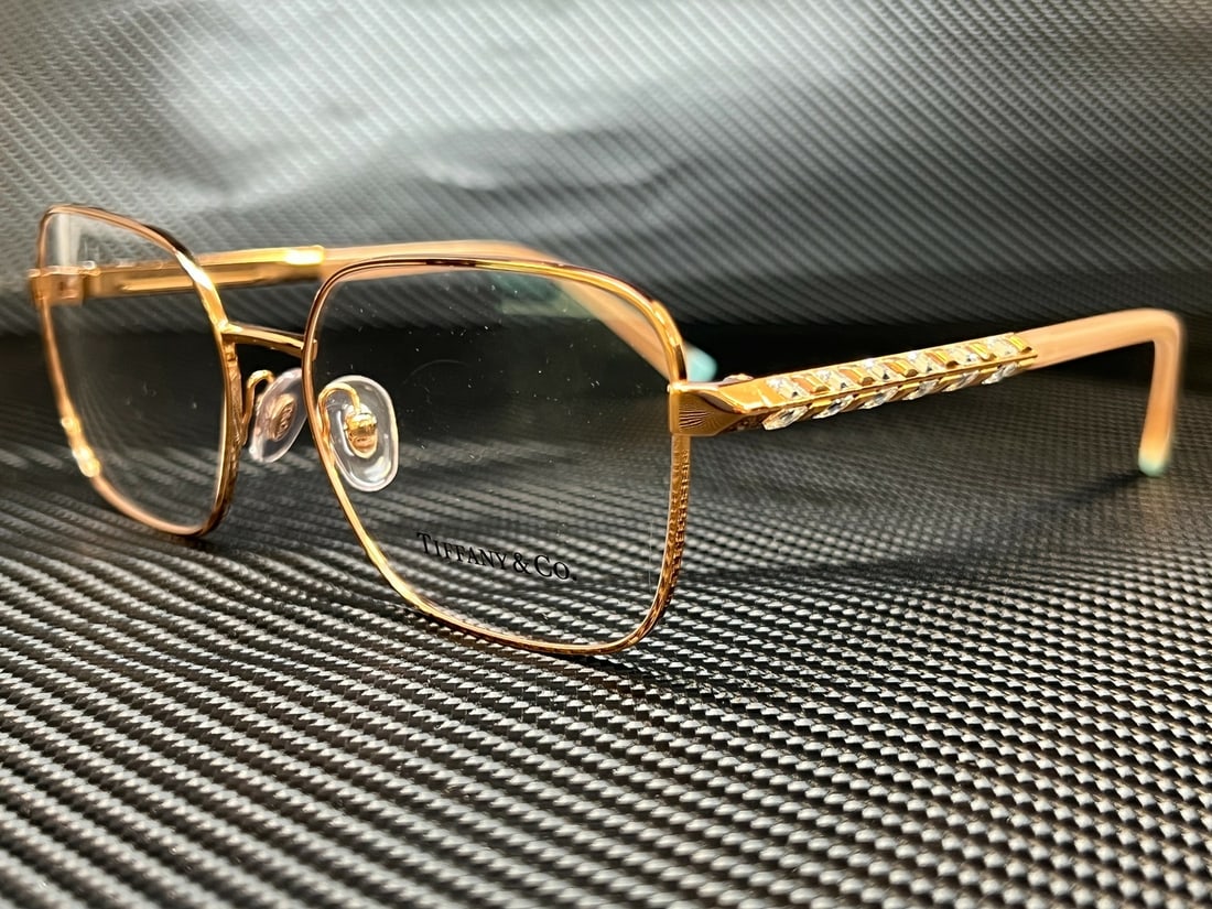 Tiffany & Co. TF1140B 6163 Rubedo Rectangle Women's Eyeglasses with Authenticity Certificate: Tiffany & Co. TF1140B 6163 Rubedo Rectangle Women's Eyeglasses with Authenticity Certificate Elevate your eyewear collection with these stunning Tiffany & Co. TF1140B 6163 eyeglasses. The elegant rect