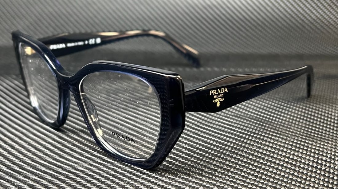 PRADA PR 18WV 08Q1O1 Blue Crystal Women's Eyeglasses with Authenticity Certificate: PRADA PR 18WV 08Q1O1 Blue Crystal Women's Eyeglasses with Authenticity Certificate Elevate your eyewear collection with these stylish PRADA PR 18WV 08Q1O1 eyeglasses. Featuring a captivating blue crys