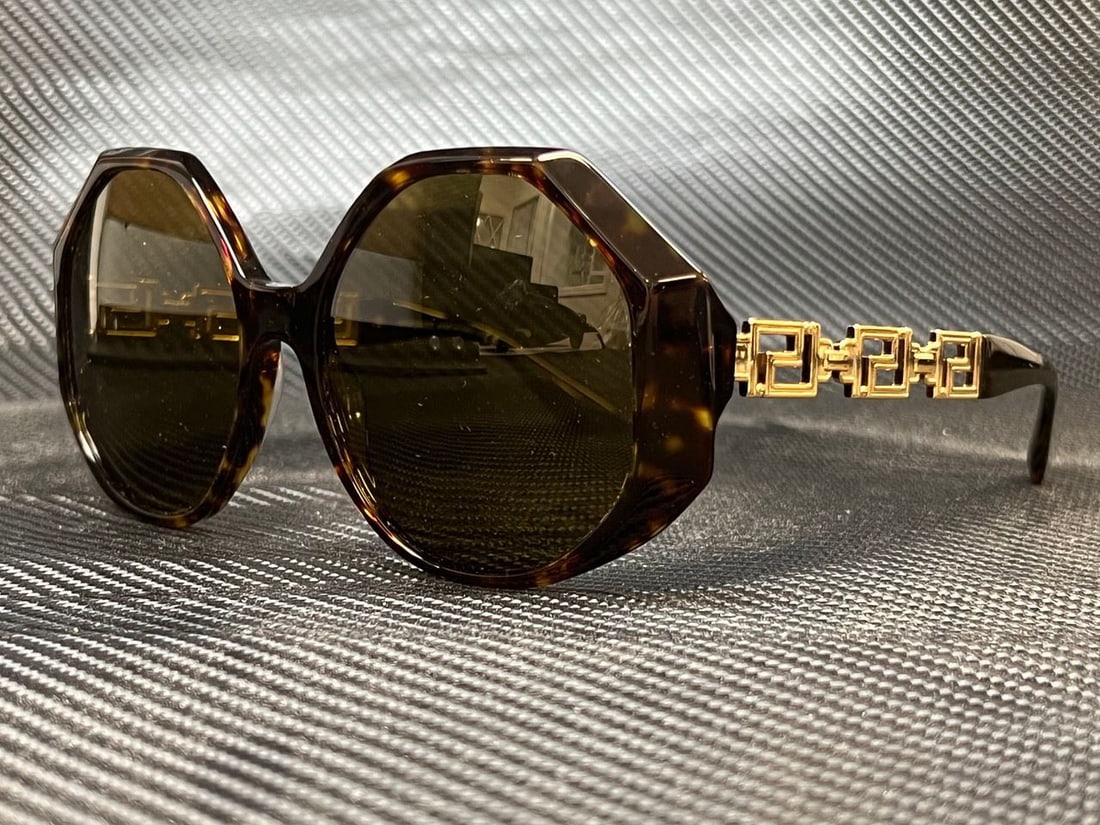 Versace VE4395 534673 Havana Square Sunglasses with Dark Brown Lenses: Versace VE4395 534673 Havana Square Sunglasses with Dark Brown Lenses Elevate your style with these stunning Versace VE4395 sunglasses, elegantly designed to complement any outfit. Featuring a chic sq