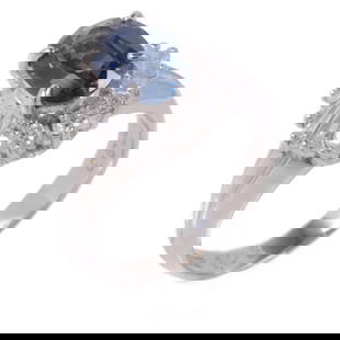 Sapphire Diamond Ring in PT900 Platinum Size 4.5: Sapphire Diamond Ring in PT900 Platinum Size 4.5 This exquisite ring features a stunning blue sapphire as its centerpiece, surrounded by sparkling diamonds, all set in premium PT900 platinum. With a r