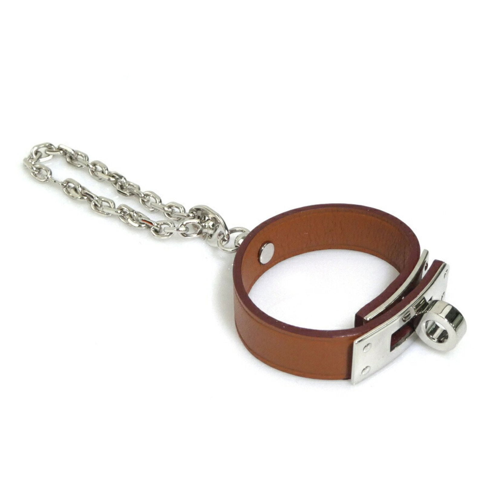 Hermes Women's Brown Silver Leather Metal Charm Glove Holder: Hermes Women's Brown Silver Leather Metal Charm Glove Holder This exquisite Hermes charm glove holder is crafted from high-quality leather and metal, showcasing a sophisticated blend of brown and silv