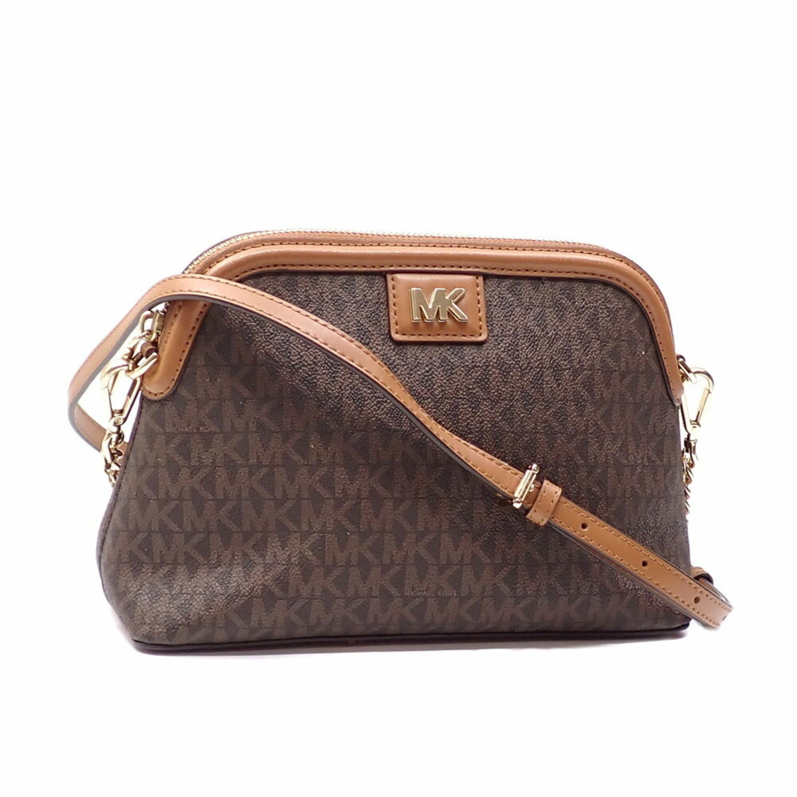 Michael Kors Brown PVC Shoulder Bag for Women 32T1GT9C3B/252: Michael Kors Brown PVC Shoulder Bag for Women 32T1GT9C3B/252 This stylish Michael Kors shoulder bag is designed for women, featuring a chic brown color and made from durable PVC material. The bag meas