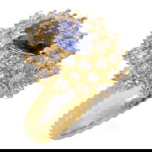 Sapphire Diamond Ring in 18K Yellow Gold by JEWELRY: Sapphire Diamond Ring in 18K Yellow Gold by JEWELRY This exquisite sapphire diamond ring features a stunning blue sapphire set in luxurious K18 (Yellow Gold). Designed as a regular fit, this ring is a