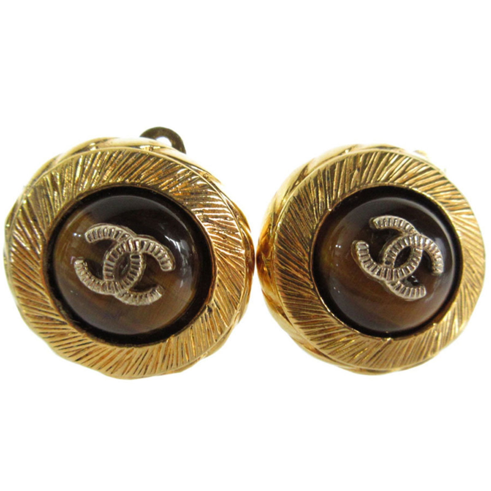 Chanel Gold Brown Clip Earrings with Rhinestones: Chanel Gold Brown Clip Earrings with Rhinestones These elegant Chanel clip earrings feature a luxurious combination of gold and brown tones, adorned with sparkling rhinestones. Designed specifically f