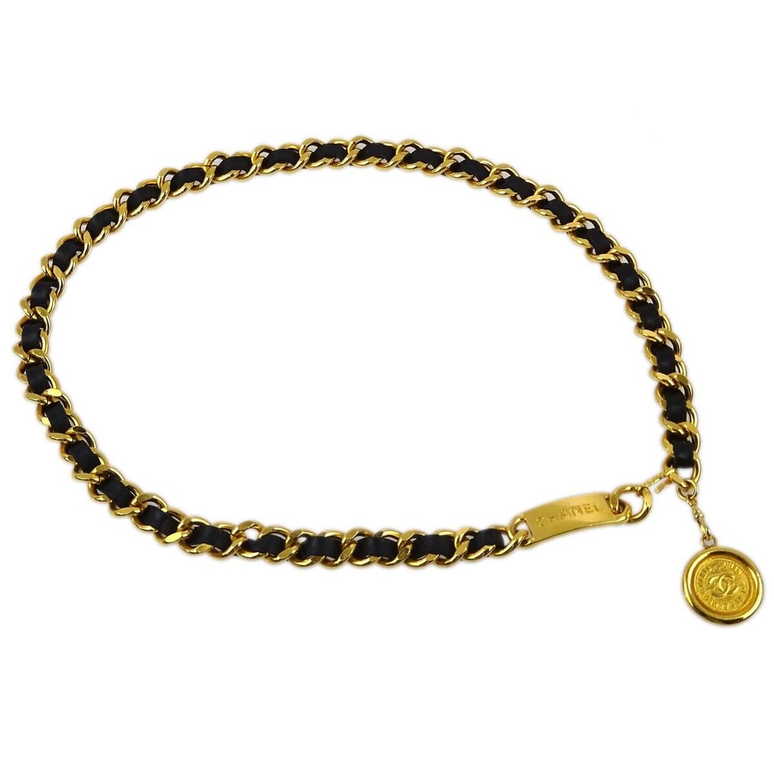 Chanel Medallion Chain Belt Black Gold Leather One Size: Chanel Medallion Chain Belt Black Gold Leather One Size Elevate your style with this exquisite Chanel Medallion Chain Belt, crafted from luxurious leather with gold-plated accents. This one-size belt
