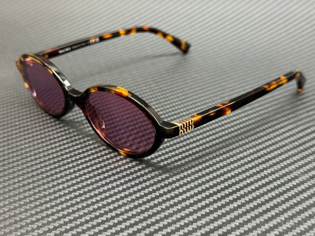 Miu Miu MU 04ZSF VAU50D Havana Pink Mirror Women's Sunglasses: Miu Miu MU 04ZSF VAU50D Havana Pink Mirror Women's Sunglasses Elevate your style with these stunning Miu Miu MU 04ZSF VAU50D sunglasses, featuring a chic Havana frame complemented by striking pink mir