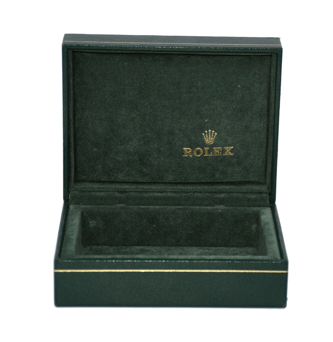 Rolex Presentation Box Model 12.00.71 Authentic Single Watch Holder: Rolex Presentation Box Model 12.00.71 Authentic Single Watch Holder This is a pre-owned Rolex presentation box, model reference 12.00.71, designed to hold a single watch. The box measures 5 x 4 x 2 in