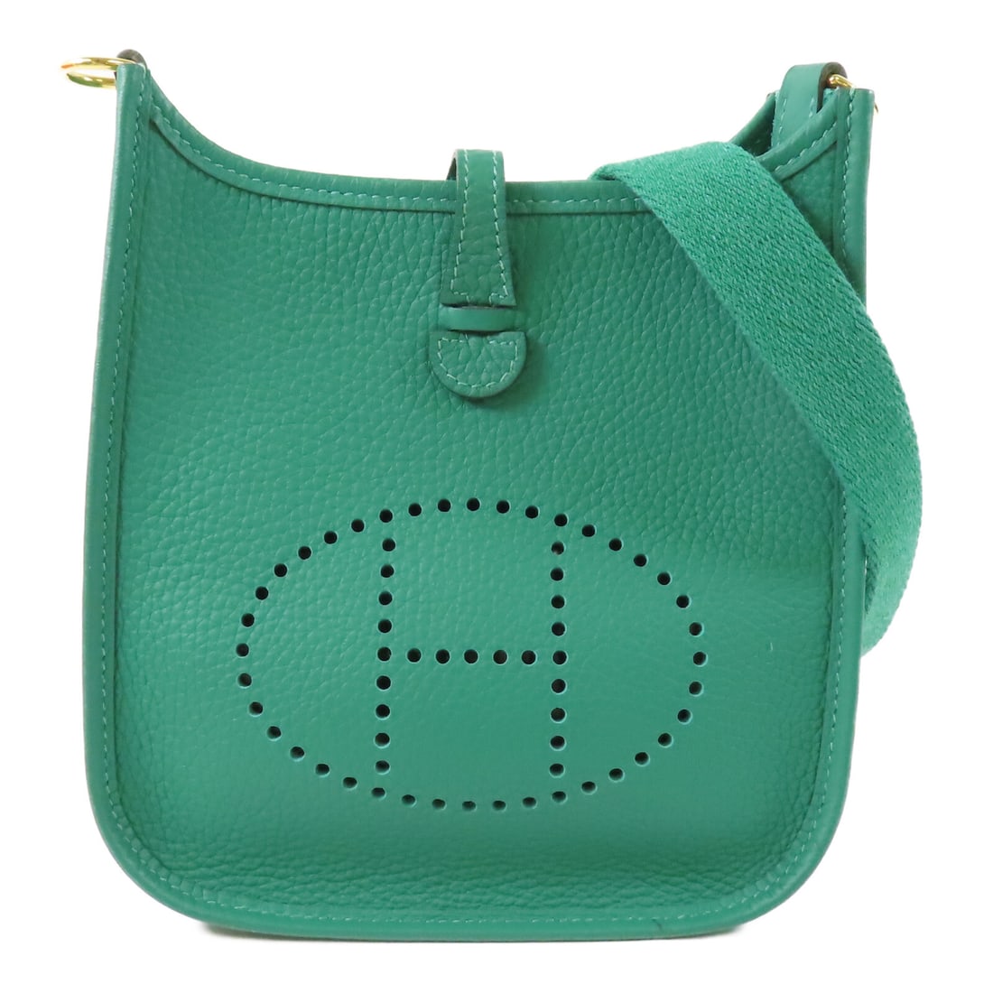 HERMES Evelyne TPM Shoulder Bag Vertigo Green Calfskin: HERMES Evelyne TPM Shoulder Bag Vertigo Green Calfskin Introducing the HERMES Evelyne TPM Shoulder Bag in a stunning Vertigo Green. Crafted from high-quality calfskin (cowhide), this stylish shoulder 