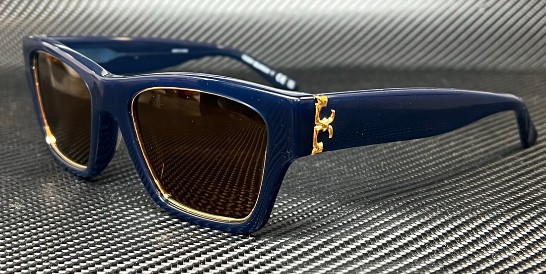 Tory Burch TY7186U 165673 Navy Frame Solid Brown Lenses Sunglasses: Tory Burch TY7186U 165673 Navy Frame Solid Brown Lenses Sunglasses Elevate your eyewear collection with these Tory Burch sunglasses, model TY7186U 165673. Featuring a stylish navy frame paired with so
