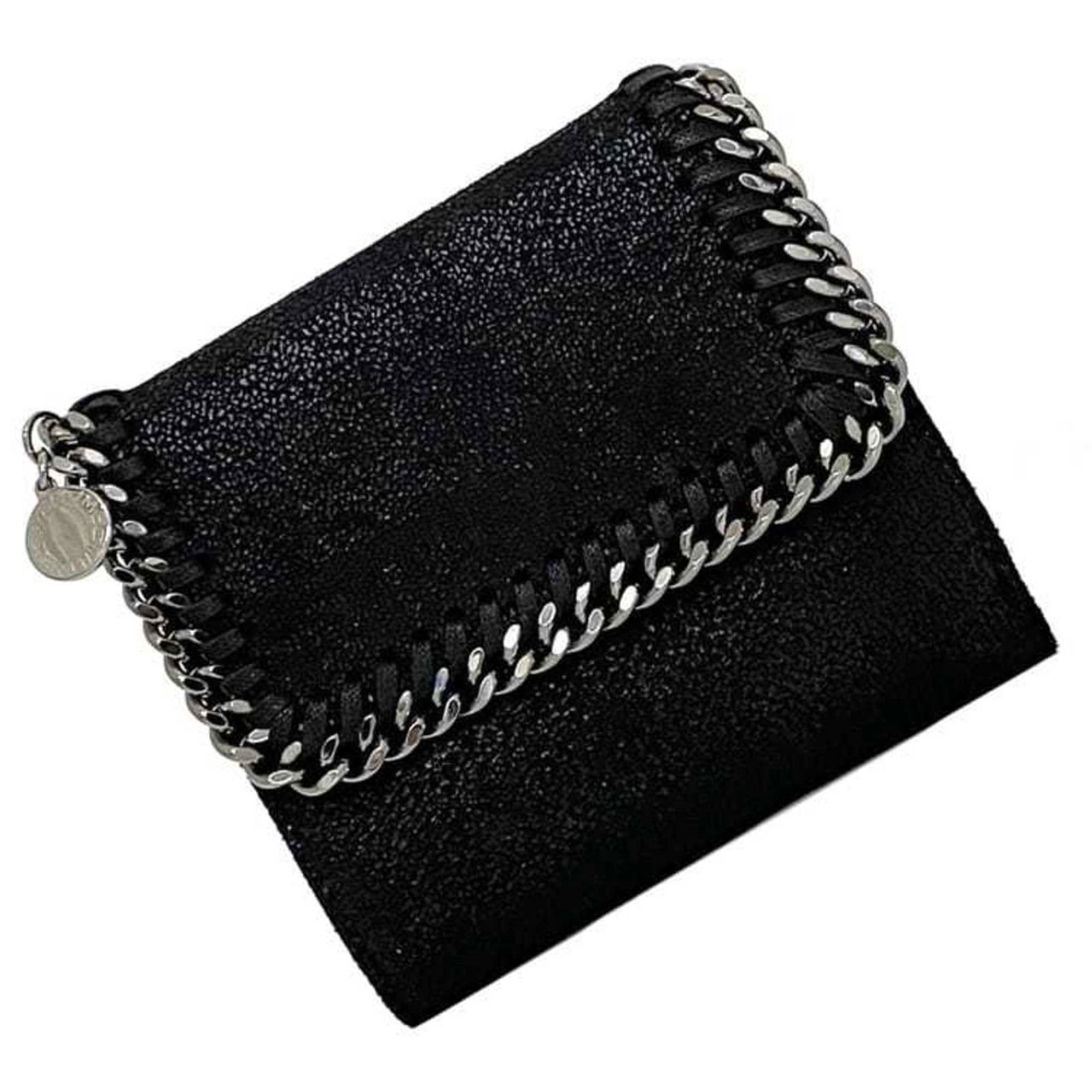 Stella McCartney Black Bi-fold Wallet Compact Faux Leather 11cm x 12cm x 3cm: Stella McCartney Black Bi-fold Wallet Compact Faux Leather 11cm x 12cm x 3cm This stylish bi-fold wallet from Stella McCartney combines practicality with a contemporary design. Crafted from high-quali