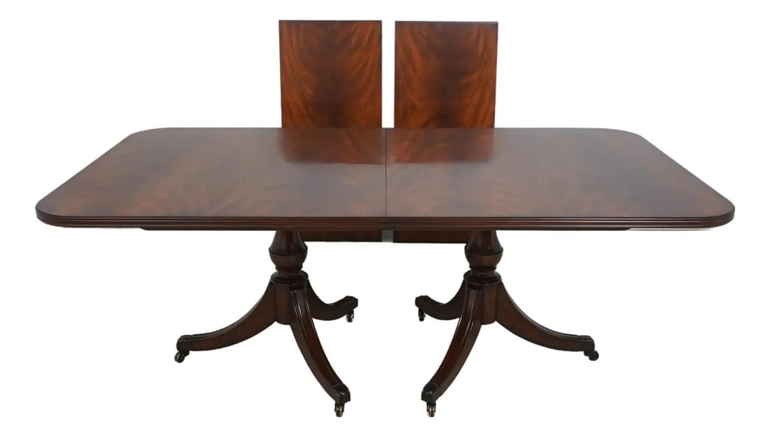 Maitland Smith Flame Mahogany Georgian Dining Table with 2 Leaves: Maitland Smith Flame Mahogany Georgian Dining Table with 2 Leaves This exquisite Maitland Smith Flame Mahogany Dining Table showcases a stunning Georgian style, perfect for adding elegance to your din
