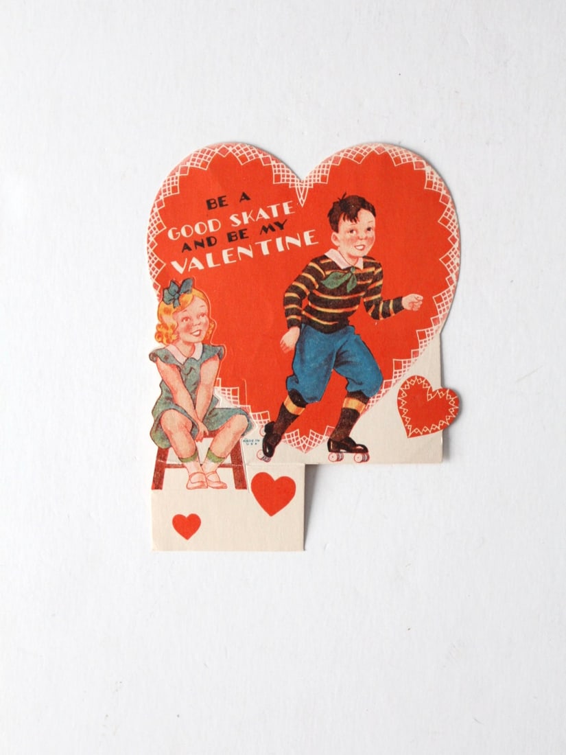 Charming Vintage 1940s 1950s Roller Skate Valentine's Card: Charming Vintage 1940s 1950s Roller Skate Valentine's Card Celebrate love with this charming vintage Valentine's Day card from the 1940s to 1950s. This delightful die-cut heart-shaped card features a