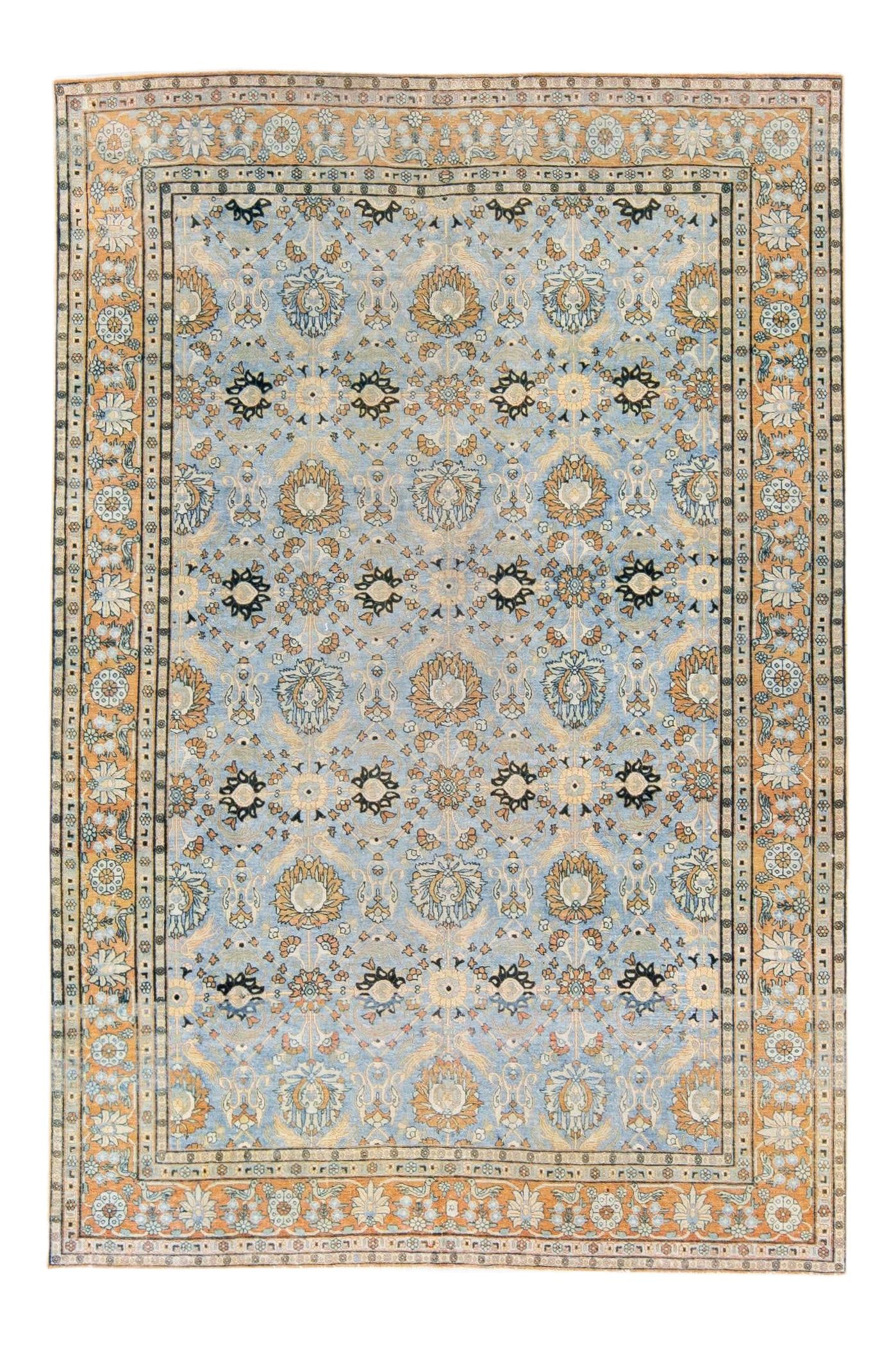 Antique Persian Tabriz Blue Floral Pattern Wool Rug 7' x 10'6: Antique Persian Tabriz Blue Floral Pattern Wool Rug 7' x 10'6 This exquisite antique Persian Tabriz rug showcases a stunning blue field adorned with an intricate all-over floral pattern. Hand-knotted 