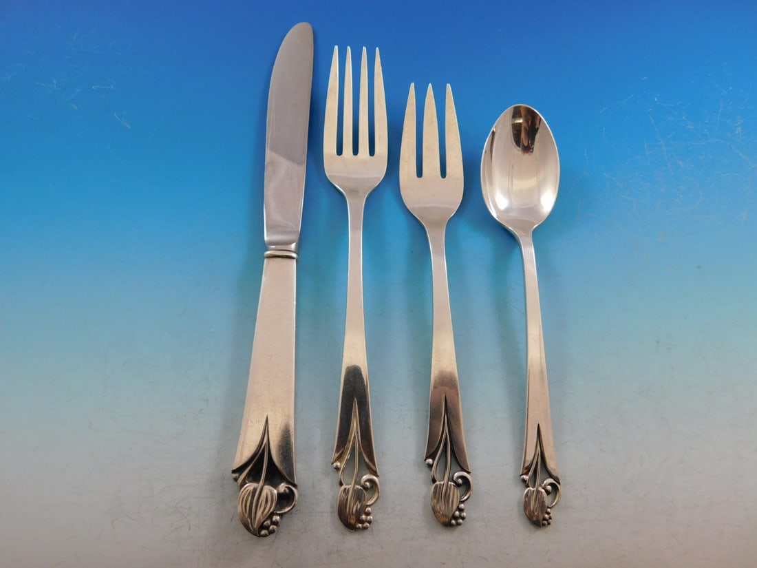 Frank Smith Woodlily Sterling Silver Flatware Set for 8 with Storage Chest 40 Pieces: Frank Smith Woodlily Sterling Silver Flatware Set for 8 with Storage Chest 40 Pieces Enhance your dining experience with the exquisite Woodlily flatware set by Frank Smith. This 40-piece sterling silv