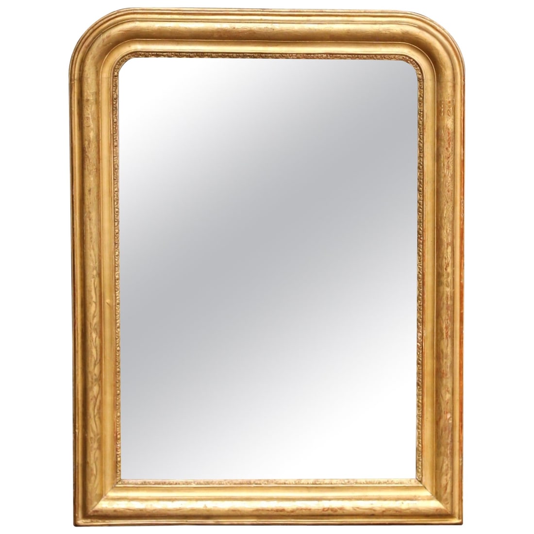 19th Century Louis Philippe Giltwood Mirror French Antique Decorative Piece: 19th Century Louis Philippe Giltwood Mirror French Antique Decorative Piece This exquisite 19th-century French wall mirror, crafted circa 1860, embodies the elegance of the Louis Philippe style. The r