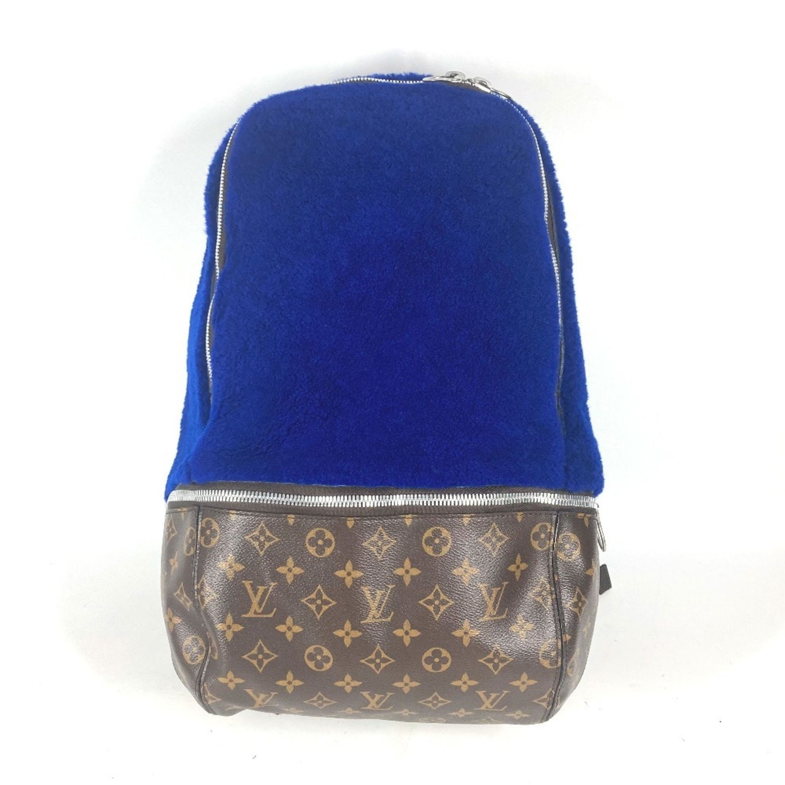 Louis Vuitton M40276 Monogram Marc Newson Backpack Blue Brown Canvas Rucksack: Louis Vuitton M40276 Monogram Marc Newson Backpack Blue Brown Canvas Rucksack Introducing the LOUIS VUITTON Monogram Marc Newson Collaboration Celebrating Backpack, a stylish and functional accessory