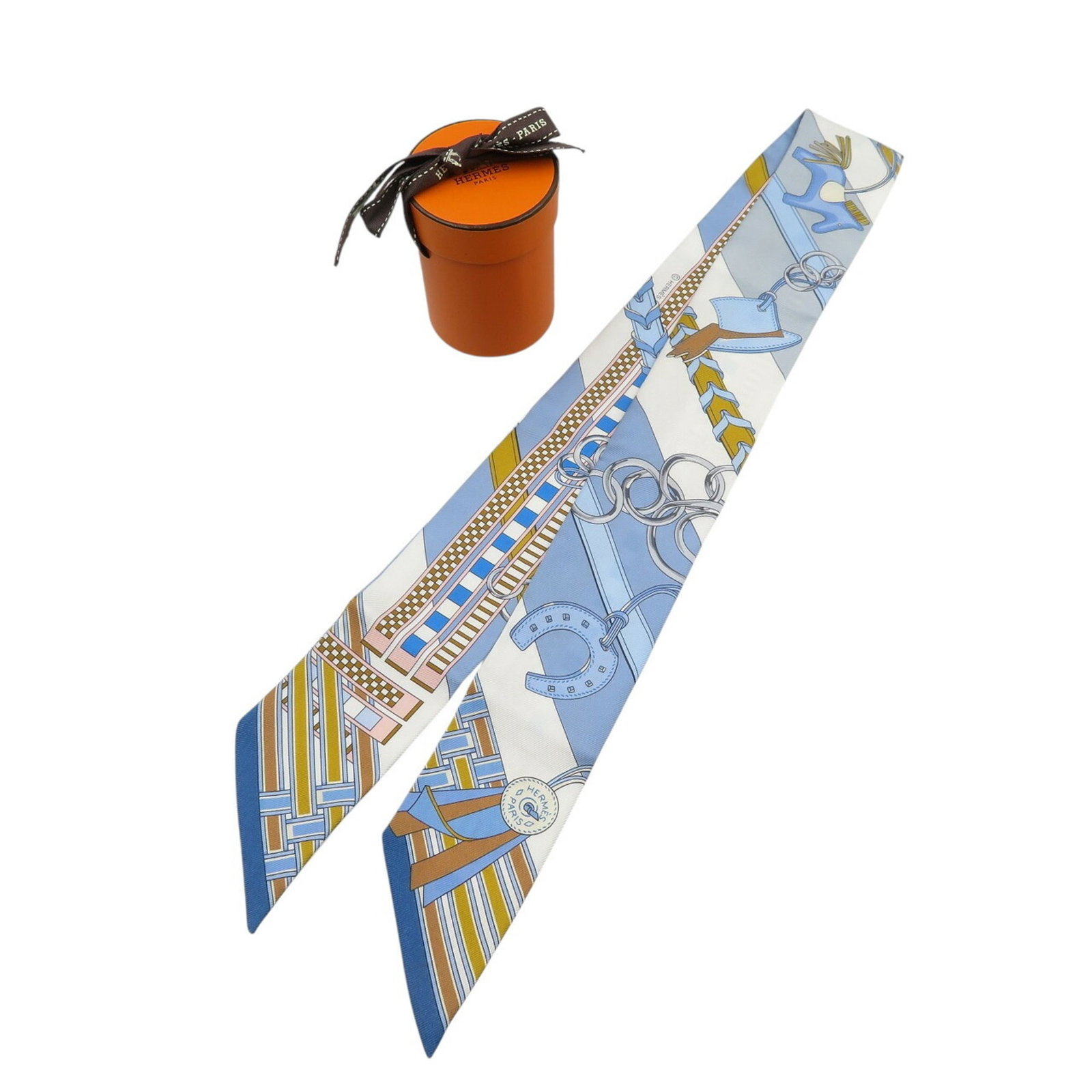 Elegant Hermes Twilly Silk Scarf Blue White Bridle Charm: Elegant Hermes Twilly Silk Scarf Blue White Bridle Charm This exquisite Hermes Twilly scarf features a captivating blue and white bridle and charm design, perfect for adding a touch of elegance to any