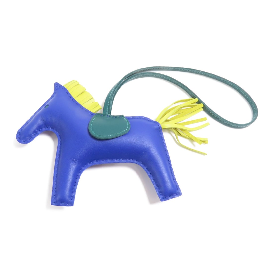 HERMES Rodeo Charm Strap Bleu Electrique Malachite Leather: HERMES Rodeo Charm Strap Bleu Electrique Malachite Leather Elevate your accessories with this exquisite HERMES Rodeo Charm Strap. Crafted from luxurious lambskin leather, this charm features a vibrant