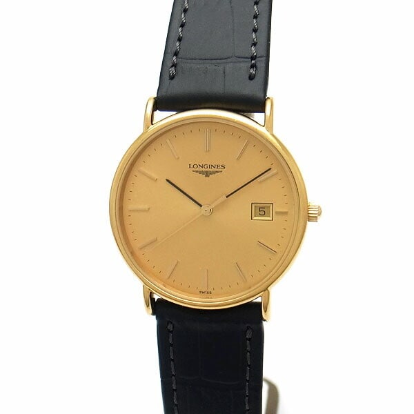 LONGINES Grand Classic L7.984.2 Gold-Plated 33mm Men's Watch: LONGINES Grand Classic L7.984.2 Gold-Plated 33mm Men's Watch The LONGINES Grand Classic L7.984.2 Men's Watch showcases timeless elegance with its gold-plated case, dial, hands, and indexes. This pre-o