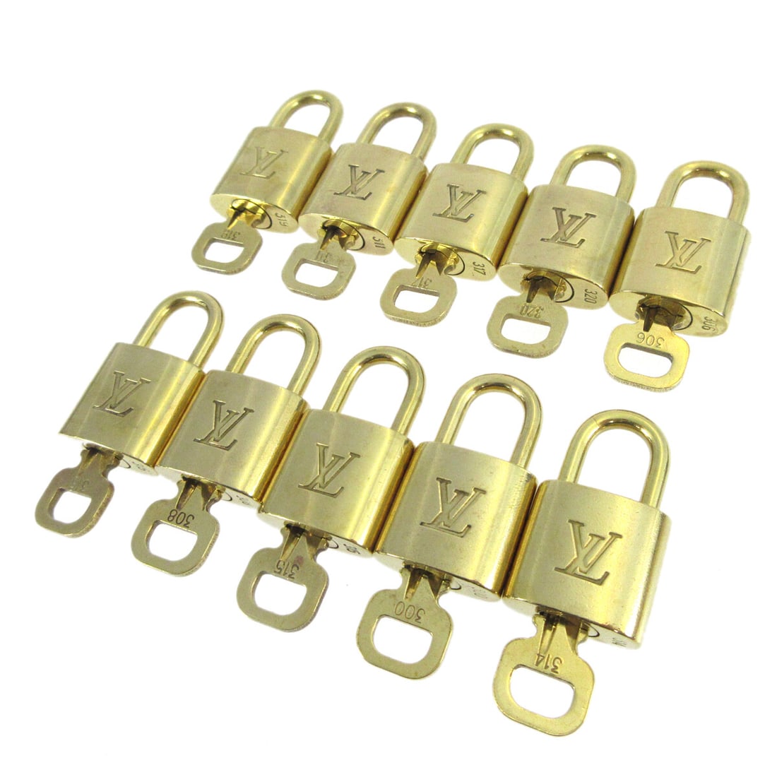 LOUIS VUITTON Padlock & Key Bag Accessories Charm Set 10 Piece Gold-tone: LOUIS VUITTON Padlock & Key Bag Accessories Charm Set 10 Piece Gold-tone Enhance your Louis Vuitton collection with this exquisite 10 Piece Padlock & Key Bag Accessories Charm Set. Crafted with gold-t