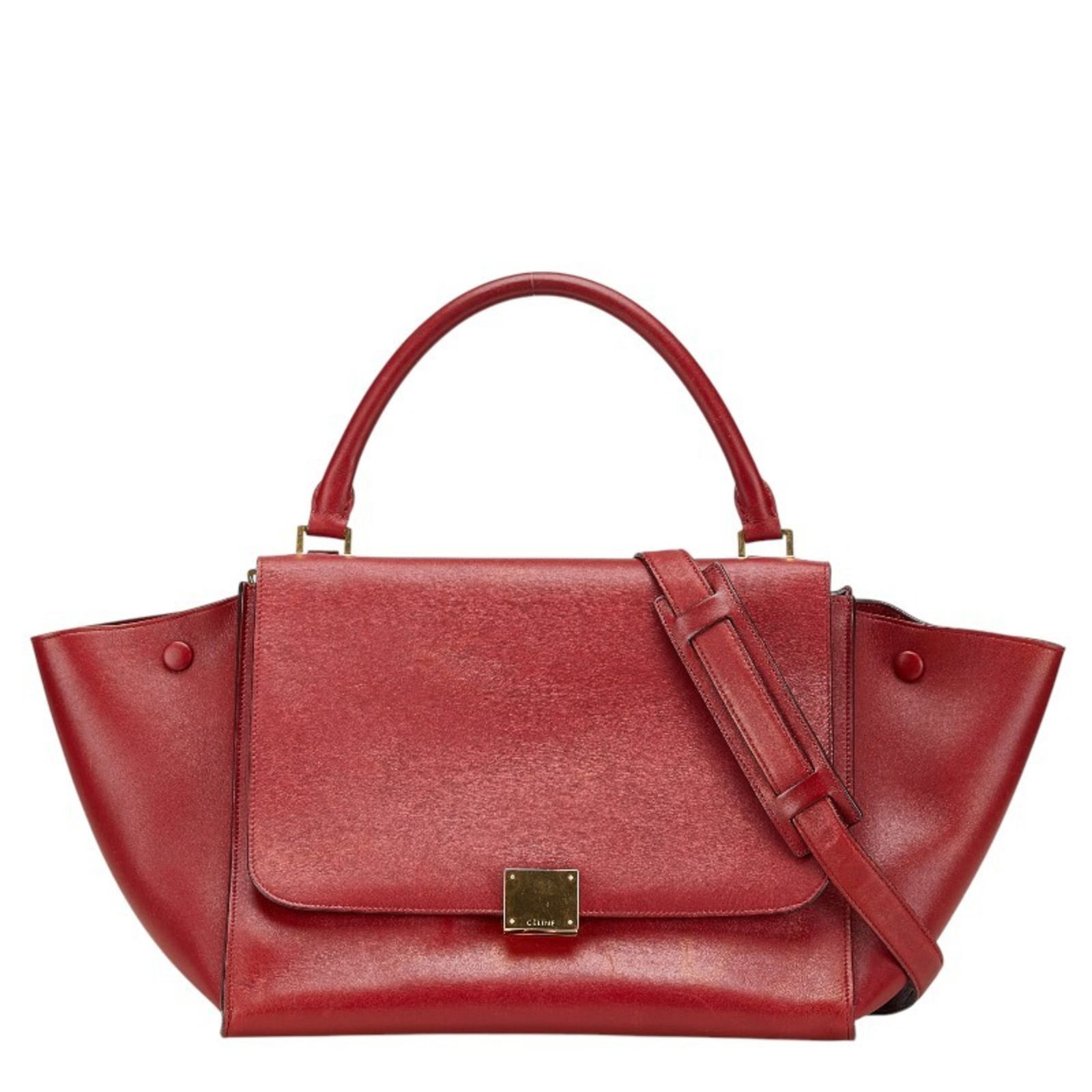 Celine Trapeze Medium Red Leather Handbag for Women: Celine Trapeze Medium Red Leather Handbag for Women This Celine Trapeze Medium Handbag is a stylish accessory designed for women. Crafted from high-quality red leather, it features a spacious interior