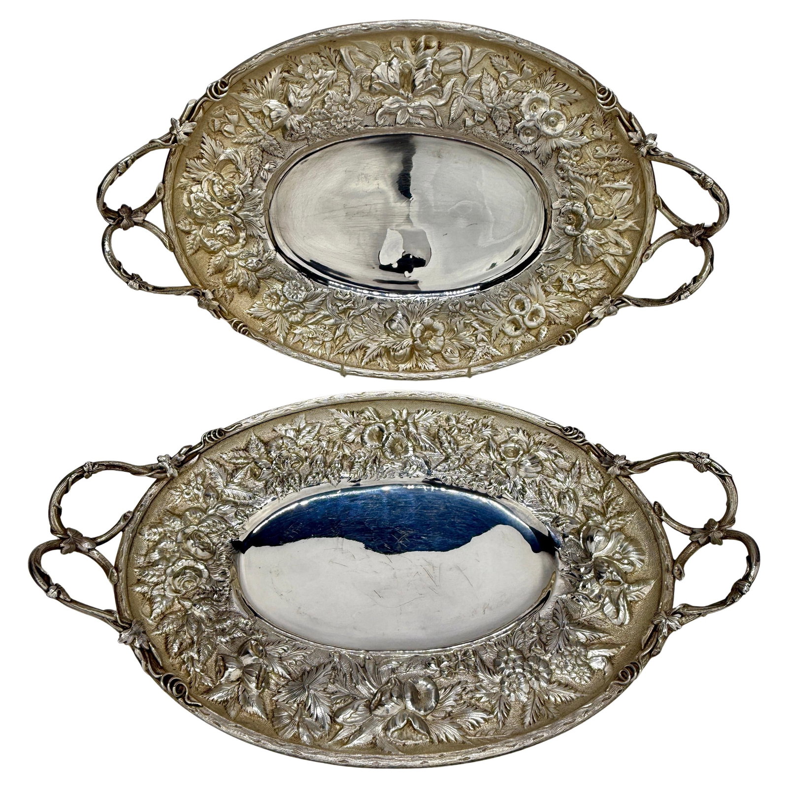 Rare S. Kirk & Son Sterling Silver Repousse Fruit Baskets Set of 2: Rare S. Kirk & Son Sterling Silver Repousse Fruit Baskets Set of 2 This stunning pair of rare American sterling silver repousse fruit baskets, crafted by S. Kirk & Son in Baltimore, showcases the opul