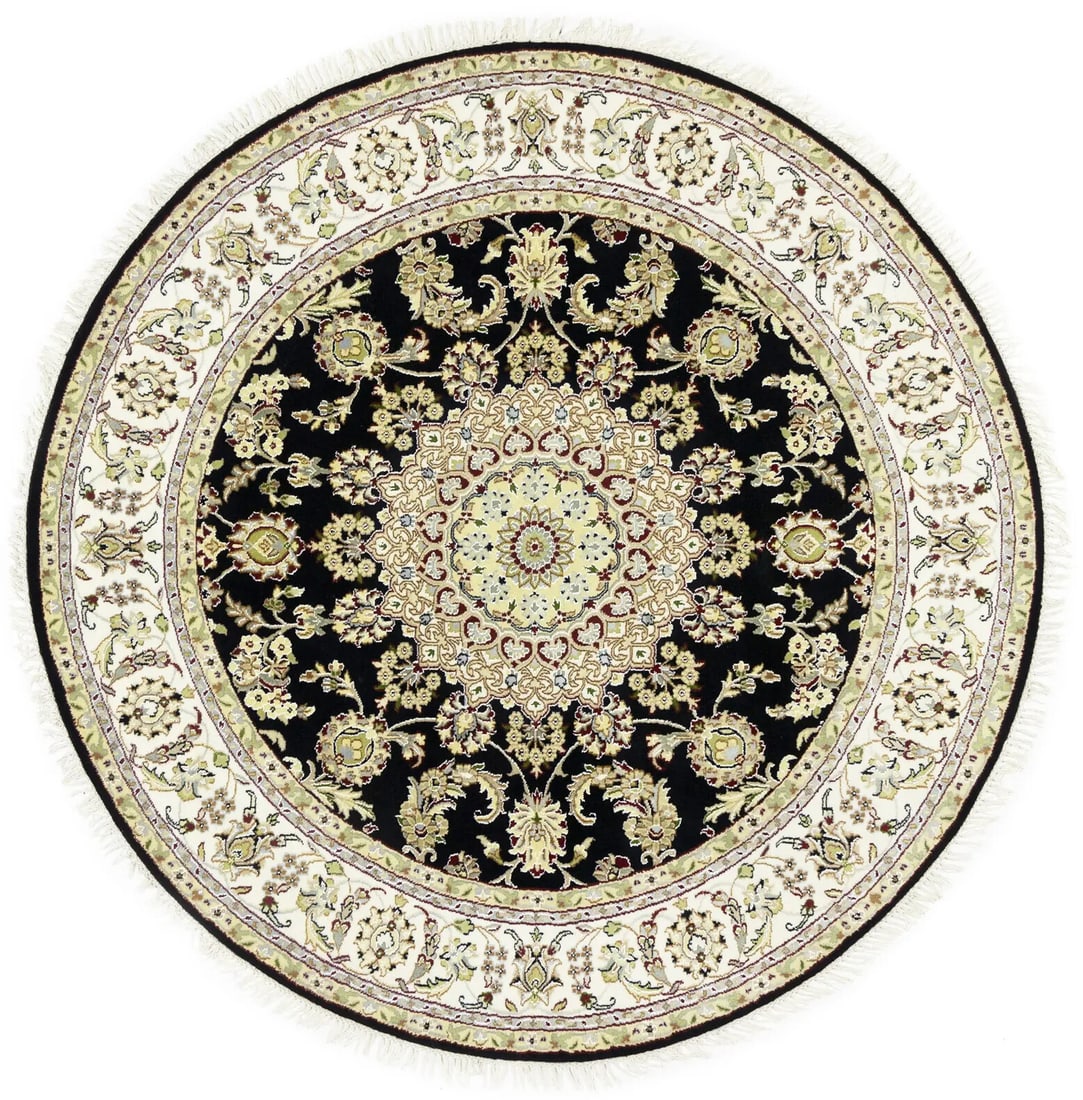 Indo-Nain Handmade Black Floral Round Wool & Silk Area Rug 6'3": Indo-Nain Handmade Black Floral Round Wool & Silk Area Rug 6'3" Enhance your living space with this Indo-Nain Handmade Black Round Oriental Rug. Made from a luxurious blend of wool and silk, this rug 