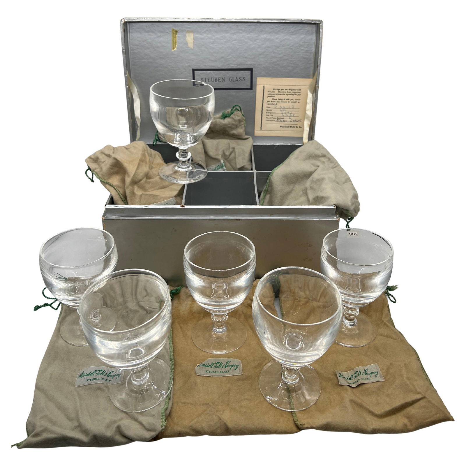 Steuben Crystal Wine Glasses Set of 6 in Marshall Field Box: Steuben Crystal Wine Glasses Set of 6 in Marshall Field Box This exquisite cased set of six Steuben crystal wine glasses stands at 5.25 inches tall, featuring a diameter of 3.5 inches. Each glass show