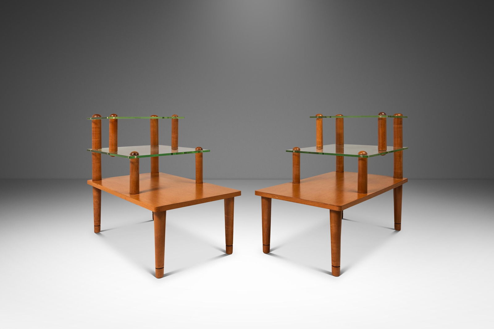 Rare Set of 2 Gilbert Rohde Three-Tier Glass End Tables for Herman Miller 1930s: Rare Set of 2 Gilbert Rohde Three-Tier Glass End Tables for Herman Miller 1930s Discover a rare set of two Mid-Century Modern Art Deco three-tiered end tables designed by the renowned Gilbert Rohde fo