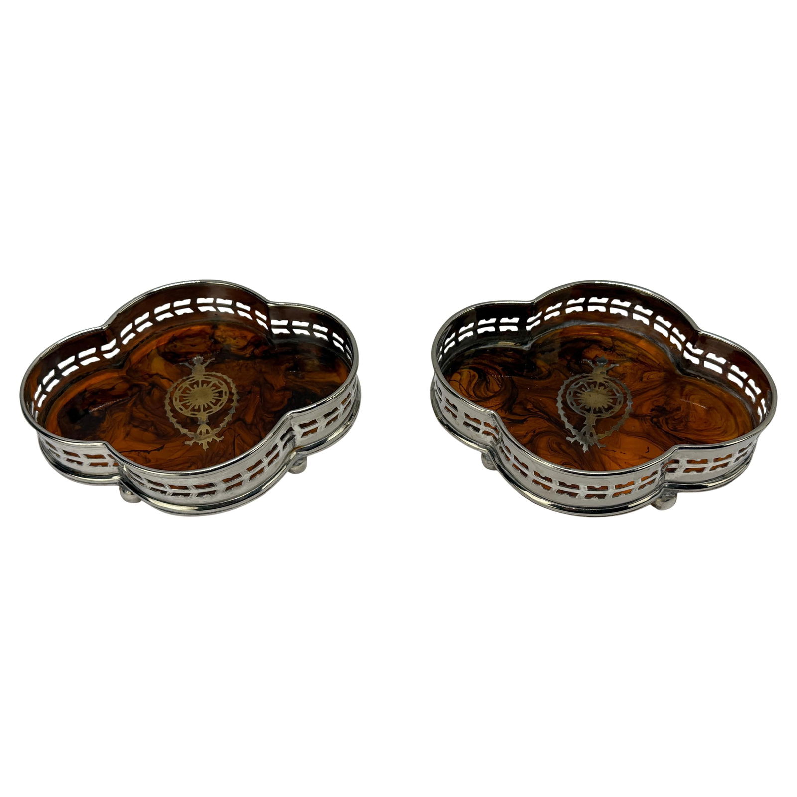 Set of 2 Neoclassical Silverplate Wine Coasters with Faux Tortoiseshell Inserts: Set of 2 Neoclassical Silverplate Wine Coasters with Faux Tortoiseshell Inserts This elegant set of two vintage wine coasters showcases exquisite craftsmanship typical of early 20th-century decorative