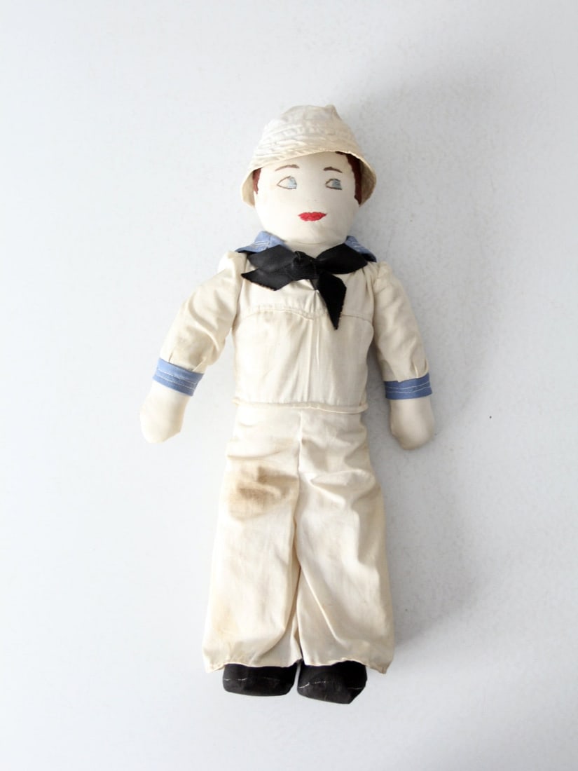 Unique 18 Inch Antique Cloth Sailor Boy Doll Handmade Vintage: Unique 18 Inch Antique Cloth Sailor Boy Doll Handmade Vintage This early 20th century sailor doll is a one-of-a-kind piece of art, handmade with a cloth body, embroidered face with brown cloth hair, a