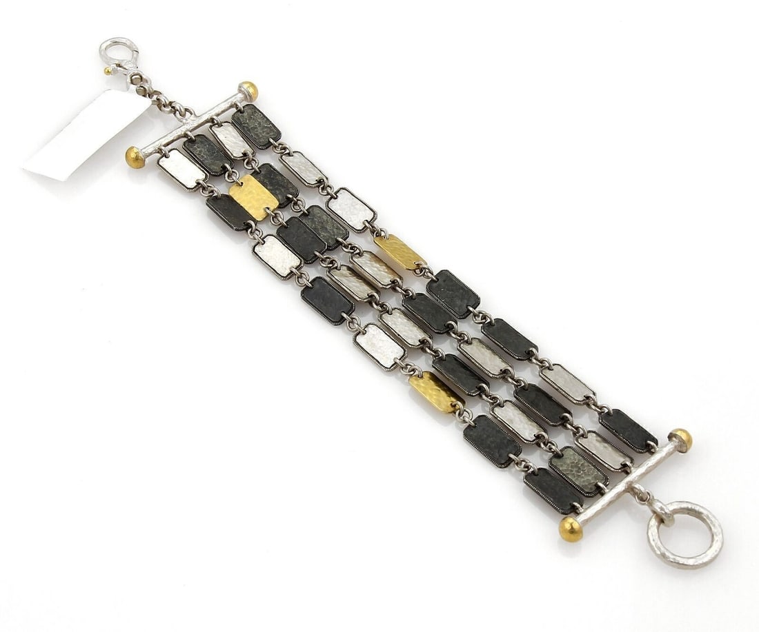 Gurhan Contour Sterling Silver and 24k Gold Multi-Strand Bracelet: Gurhan Contour Sterling Silver and 24k Gold Multi-Strand Bracelet Introducing the Gurhan Contour Sterling & 24k Gold Rectangle Bars Multi-Strand Bracelet, a luxurious fine jewelry piece. Crafted from