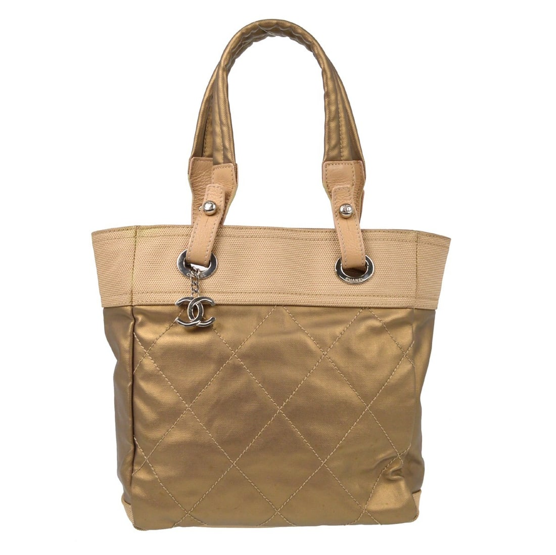 Chanel Gold Canvas Paris-Biarritz Tote PM Handbag with Double Handles: Chanel Gold Canvas Paris-Biarritz Tote PM Handbag with Double Handles Elevate your style with the Chanel Gold Canvas Paris-Biarritz Tote PM Handbag, a perfect accessory for casual occasions. This styl